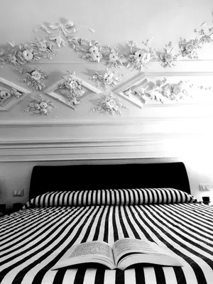 Letto o letti in una camera di Suite Il Letto Sotto Il Tetto