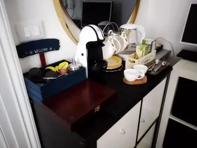 Cucina o angolo cottura di Suite Il Letto Sotto Il Tetto