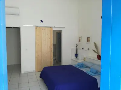 Letto o letti in una camera di Mediterranea Guesthouse B&B