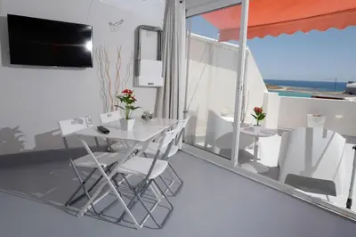 TV o dispositivi per l'intrattenimento presso Apartments TERRAZZA DEI DUE MARI