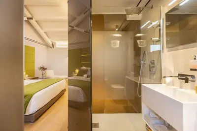 Letto o letti in una camera di Palazzo Marletta Luxury House Hotel