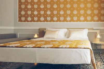 Letto o letti in una camera di Palazzo Marletta Luxury House Hotel