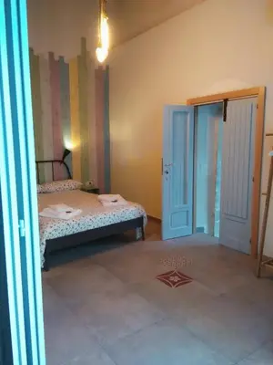 Letto o letti in una camera di Lucernaio Rooms