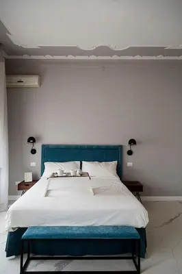 Letto o letti in una camera di Le Bain Suite - accanto al Mare vicinissima a Ortigia e al Teatro