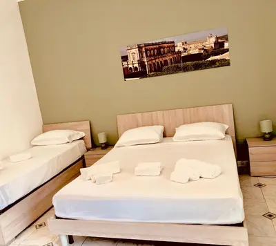 Letto o letti in una camera di La Madonnina
