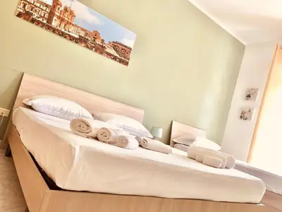 Letto o letti in una camera di La Madonnina