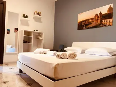 Letto o letti in una camera di La Madonnina