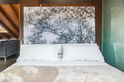 Letto o letti in una camera di Sant'Agostino Loft