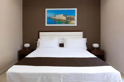 Letto o letti in una camera di Il Duomo
