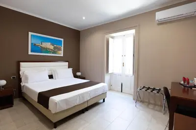 Letto o letti in una camera di Il Duomo