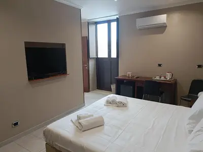 Letto o letti in una camera di Il Duomo
