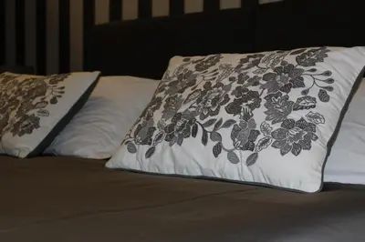 Letto o letti in una camera di Hotel Trieste