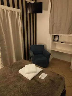 Letto o letti in una camera di Hotel Trieste