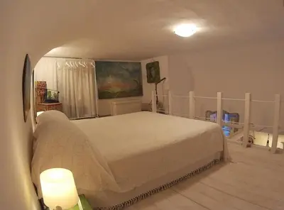 Letto o letti in una camera di AMURIMARI Catania