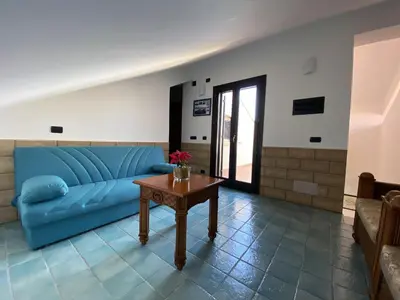Area soggiorno di Hotel Capo Campolato