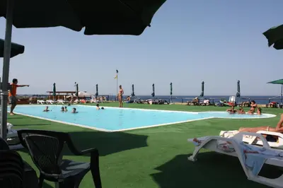 Piscina di Hotel Capo Campolato o nelle vicinanze