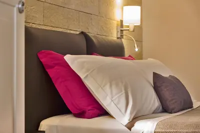 Letto o letti in una camera di Sciala Ortigia B&B