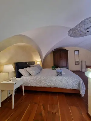 Letto o letti in una camera di My Loft Catania