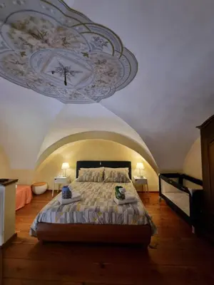 Letto o letti in una camera di My Loft Catania