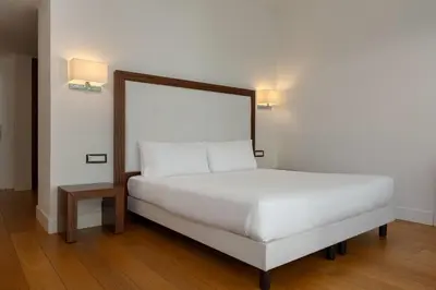 Letto o letti in una camera di Dolce by Wyndham Siracusa - I Monasteri Golf & Spa