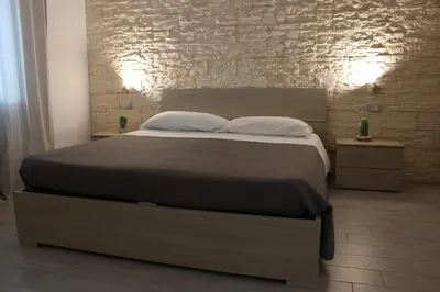 Letto o letti in una camera di DIONISEA