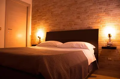 Letto o letti in una camera di DIONISEA