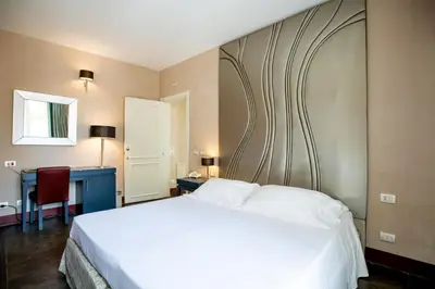 Letto o letti in una camera di De Stefano Palace Luxury Hotel