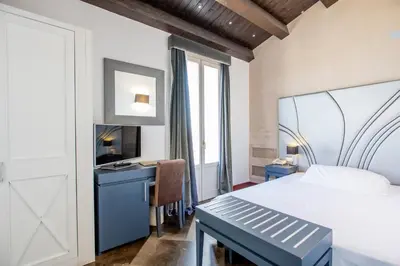 Letto o letti in una camera di De Stefano Palace Luxury Hotel