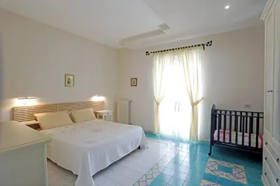 Letto o letti in una camera di Eremo delle Grazie
