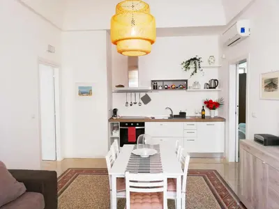 Cucina o angolo cottura di CIVICO 5 ORTIGIA - TERRAZZA VISTA MARE