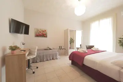 Letto o letti in una camera di Le Dimore del Duomo