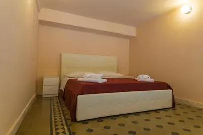 Letto o letti in una camera di Badiula Flat