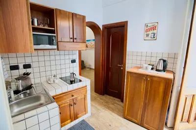 Cucina o angolo cottura di Il Magnifico Apartment