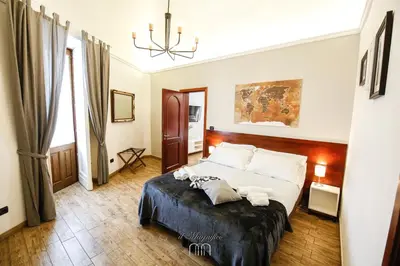 Letto o letti in una camera di Il Magnifico Apartment