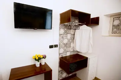 TV o dispositivi per l'intrattenimento presso Il Magnifico Apartment