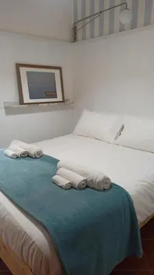 Letto o letti in una camera di Sicilian Seaside Apartments