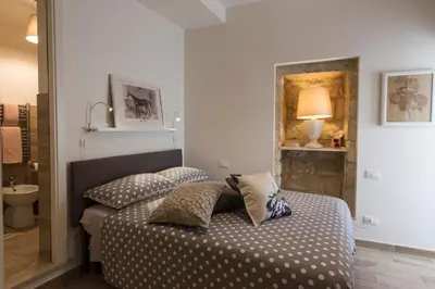 Letto o letti in una camera di Casa Sabir