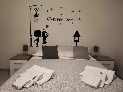 Letto o letti in una camera di mungiBEDdu Apartment