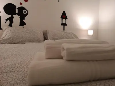 Letto o letti in una camera di mungiBEDdu Apartment