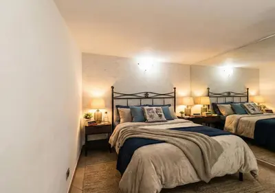 Letto o letti in una camera di CENTRO STORICO - Enjoy House Catania