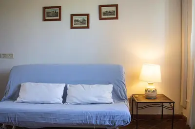 Letto o letti in una camera di Tenuta San Calogero Appartamento Salvia