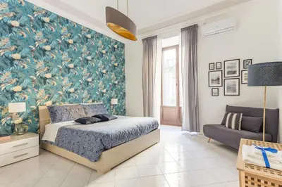 Letto o letti in una camera di Green Apartment Catania