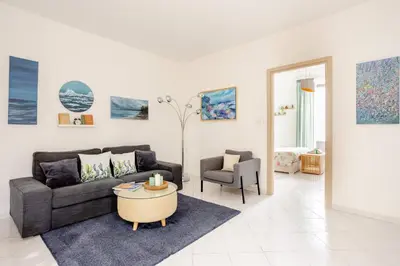 Area soggiorno di Green Apartment Catania