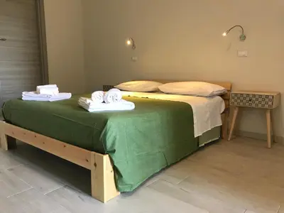 Letto o letti in una camera di Le Camere Di Don Vito