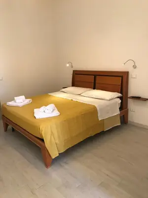 Letto o letti in una camera di Le Camere Di Don Vito