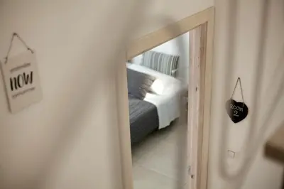 Letto o letti in una camera di Piazza Salvatore 7, gocce di sicilia