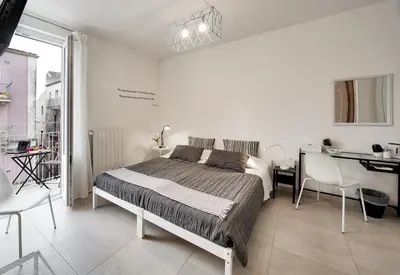 Letto o letti in una camera di Piazza Salvatore 7, gocce di sicilia