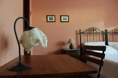Letto o letti in una camera di B&B Al Mercato di Ortigia