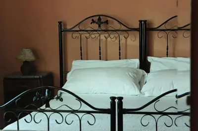 Letto o letti in una camera di B&B Al Mercato di Ortigia