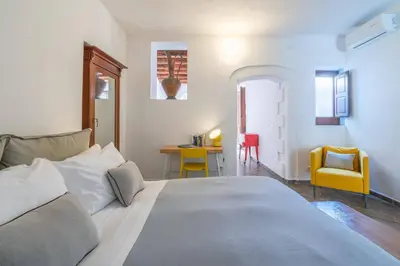 Letto o letti in una camera di Studio Alagona, three minutes walk from the sea